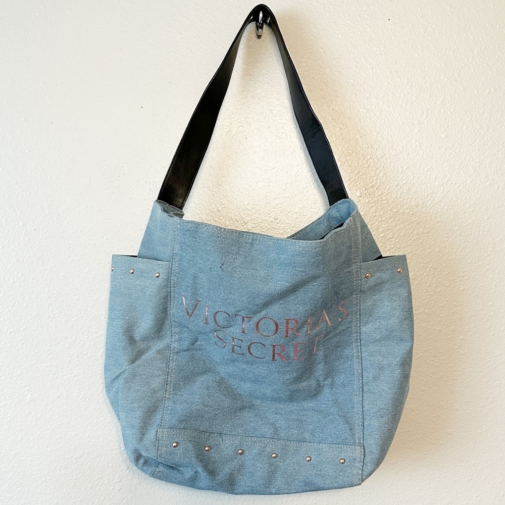 Victoria’s Secret denim tote bag rose gold metallic logo and studs side pockets